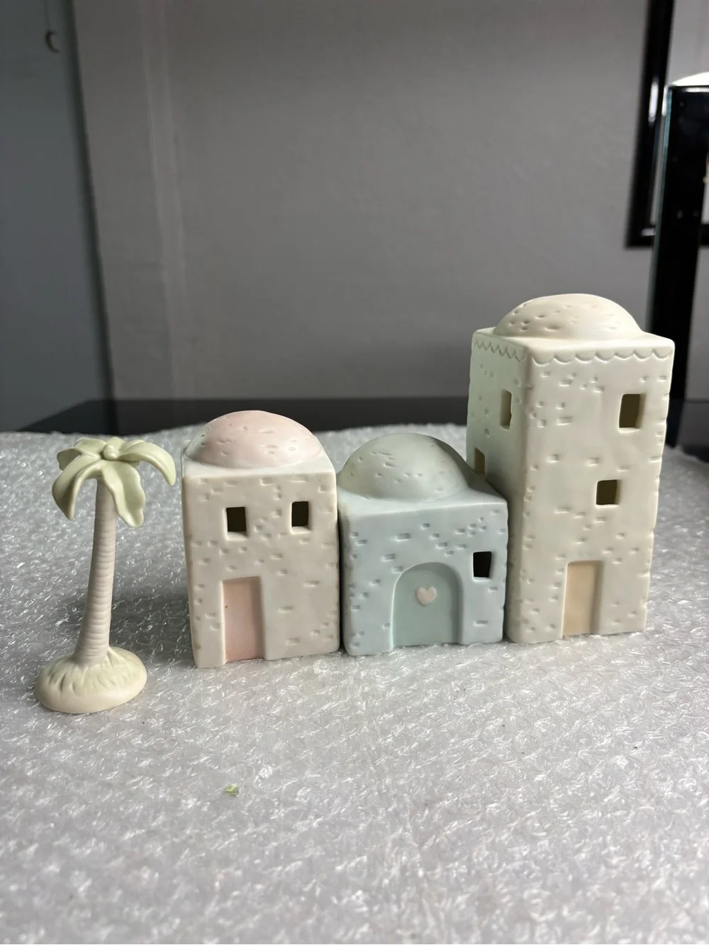 Precious Moments 4-piece set porcelain bisque nativity buildings and a palm tree